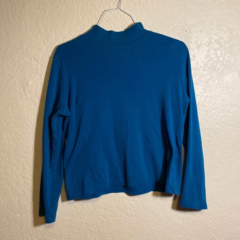 Blue turtleneck
